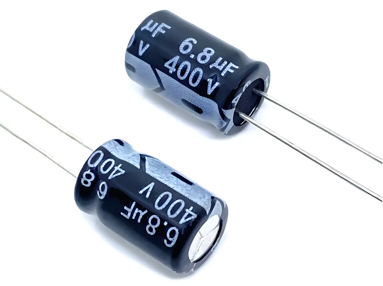 Two axial lead aluminum electrolytic capacitors with 400V and 6.8μF ratings on a white background.