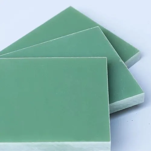 Stack of green FR-4 fiberglass epoxy laminate sheets