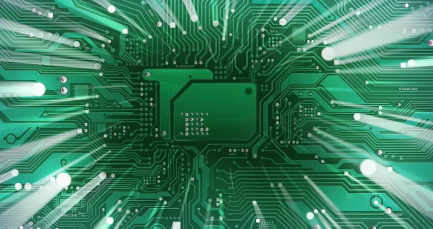 Abstract art of green PCB center chip and high-speed traces