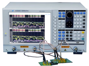 Dielectric strength testing of PCB material using a network analyzer to measure breakdown voltage for high-voltage application safety.